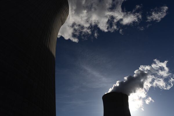 The cooling towers for units 4 (left) and 3 (right) are seen at Plant Vogtle, operated by Georgia Power Co., in east Georgia's Burke County near Waynesboro, on May 29. (Arvin Temkar/AJC 2024)