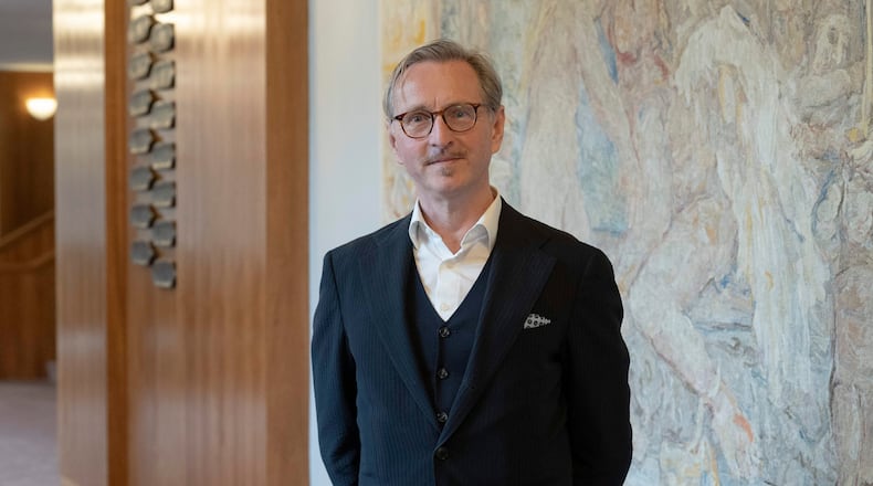 Peter de Caluwe, who will become artistic director of the Salzburg Festival in October 2027, poses at the Grosses Festspielhaus in Salzburg, Austria on Friday, Sept. 18, 2026. (Jan Friese/Salzburg Festival via AP)