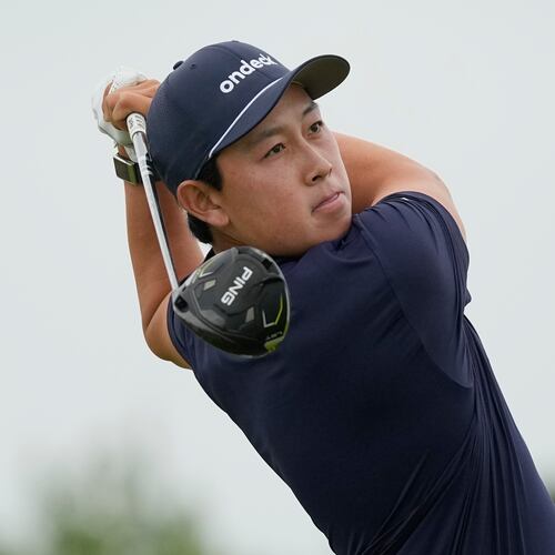Dylan Wu watches his tee shot on the 13th hole during the first round of the U.S. Open golf tournament at Shinnecock Hills Golf Club in Southampton, N.Y., Thursday, June 18, 2026.(AP Photo/George Walker IV)