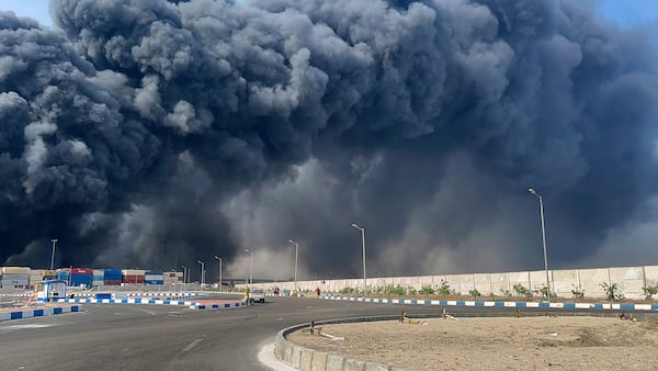 In this photo provided by Iranian Students' News Agency, ISNA, a black smoke rises in the sky after a massive explosion rocked a port near the southern port city of Bandar Abbas, Iran, Saturday, April 26, 2025. (Razieh Pudat/ISNA via AP)