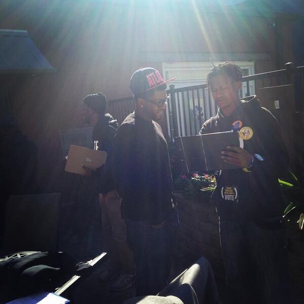 Oscar Cain(far right) at a community event. (Courtesy of LaShunda Campbell)