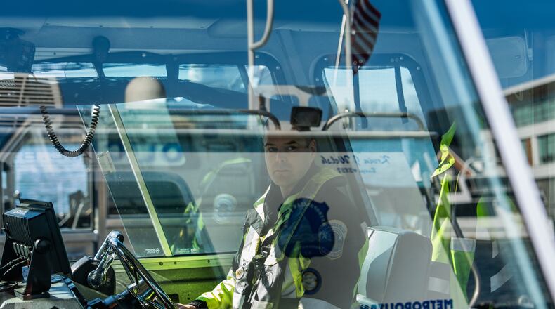 Metropolitan Police Department diver Robert Varga poses for a portrait, Thursday, Jan. 22, 2026, in Washington. (AP Photo/Julia Demaree Nikhinson)
