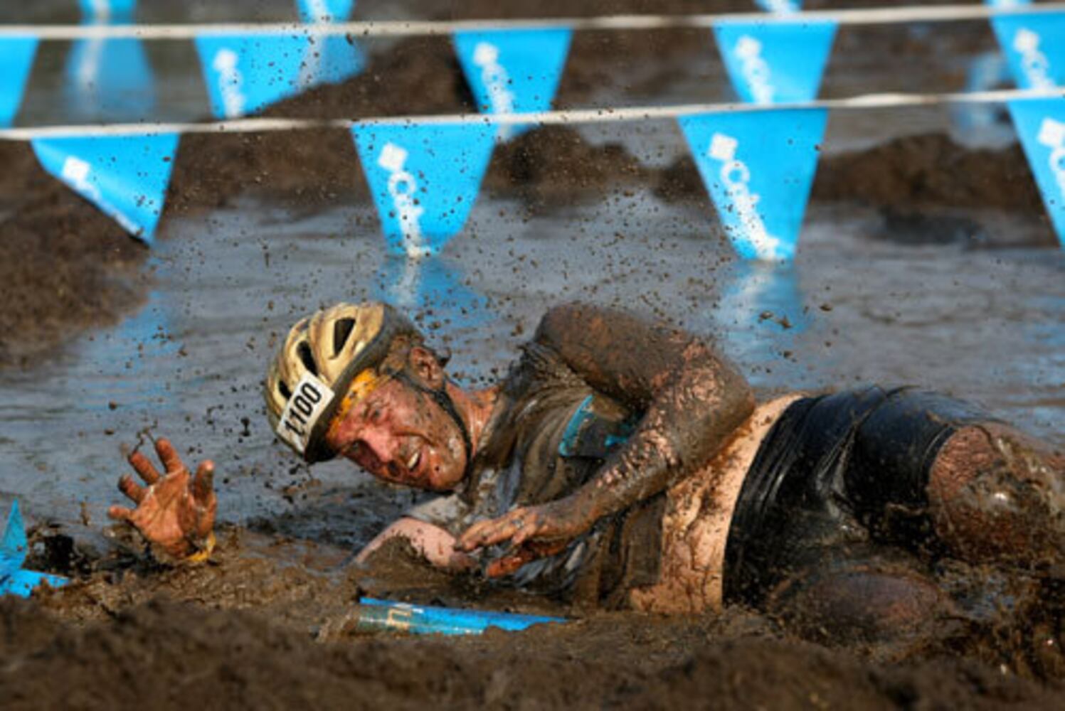 Athletes dive into competition at Columbia Muddy Buddy