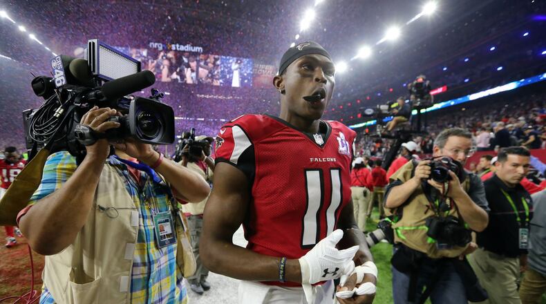 FEBRUARY 5, 2017 HOUSTON TX Atlanta Falcons wide receiver Julio Jones (11) leaves the field at the end of the game as the Atlanta Falcons meet the New England Patriots in Super Bowl LI at NRG Stadium in Houston, TX, Sunday, February 5, 2017. The Patriots beat the Falcons in OT 34-28. Curtis Compton/AJC