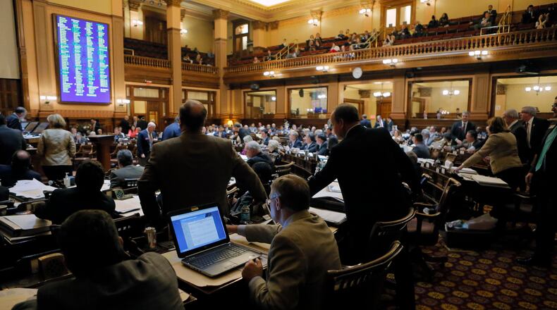 Mar. 3 2017 - Atlanta - House members vote dozens of bills, including one on charter schools, as the session goes late into the night. Crossover day on the 28th legislative day of the 2017 Georgia General Assembly. BOB ANDRES /BANDRES@AJC.COM