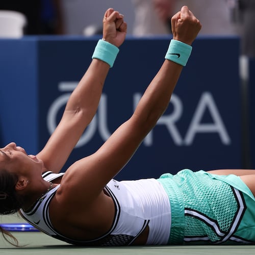 Zheng Qinwen, of China, celebrates after she won her match against Madison Keys, of the United States, during the third round of the U.S. Open tennis championships Saturday, Sept. 5, 2026, in New York. (AP Photo/Heather Khalifa)