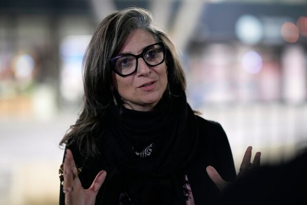 U.N. Special Rapporteur for the Occupied Palestinian Territories Francesca Albanese talks to The Associated Press at the Sarajevo airport in Sarajevo, Bosnia and Herzegovina, Thursday, July 10, 2025, on her way to events commemorating the 30th anniversary of the Srebrenica genocide. (AP Photo/Darko Bandic)