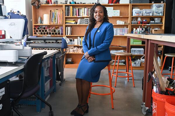 Spelman College’s new president Ayanna Howard poses for a portrait inside Spelman's Innovation Laboratory. The lab has 3D printers and scanners, laser cutters and other tools students can use to work on projects. The lab was made possible by a $10 million grant from the Arthur M. Blank Family Foundation. (Natrice Miller for the AJC)