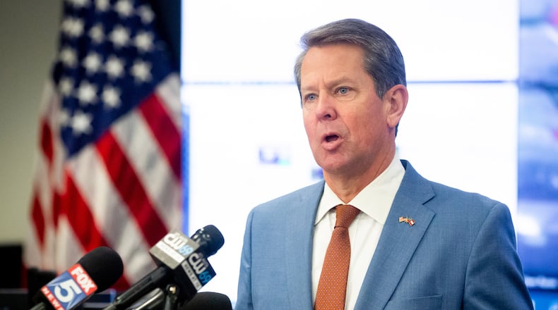Georgia Gov. Brian Kemp talks with the media about Georgia’s four mass COVID-19 vaccination sites Monday at the State Operations Center, GEMA, February 22, 2021 STEVE SCHAEFER FOR THE ATLANTA JOURNAL-CONSTITUTION