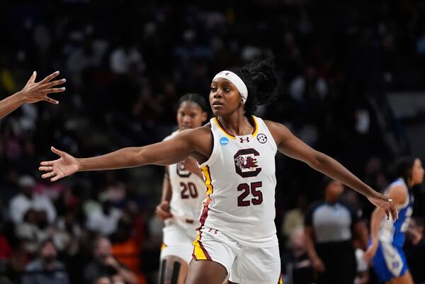 South Carolina guard Raven Johnson (25) celebrates her 3-point basket during the first half against Duke in the Elite Eight of the NCAA college basketball tournament, Sunday, March 30, 2025. in Birmingham, Ala. (AP Photo/Gerald Herbert)
