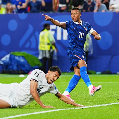 France's Kylian Mbappe (10) celebrates after scoring their second goal as Iraq's Zaid Tahseen (4) reacts during the World Cup Group I soccer match between France and Iraq in Philadelphia, Monday, June 22, 2026. (AP Photo/Derik Hamilton)