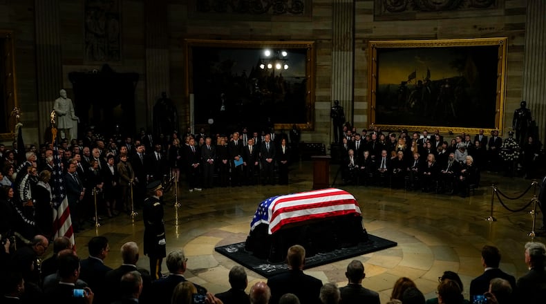 Members of Congress and guests as the coffin of former President Jimmy Carter arrives at the Rotunda of the Capitol in Washington, on Tuesday, Jan. 7, 2025. (Kent Nishimura/The New York Times)