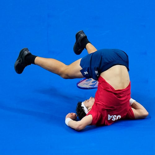 United States' Ben Shelton falls after returning the ball to Czechia's Jiri Lehecka during the Davis Cup second round qualifier match between the Czech Republic and the United States, in Prague, Friday, Sept. 18, 2026. (AP Photo/Petr David Josek)