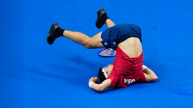 United States' Ben Shelton falls after returning the ball to Czechia's Jiri Lehecka during the Davis Cup second round qualifier match between the Czech Republic and the United States, in Prague, Friday, Sept. 18, 2026. (AP Photo/Petr David Josek)