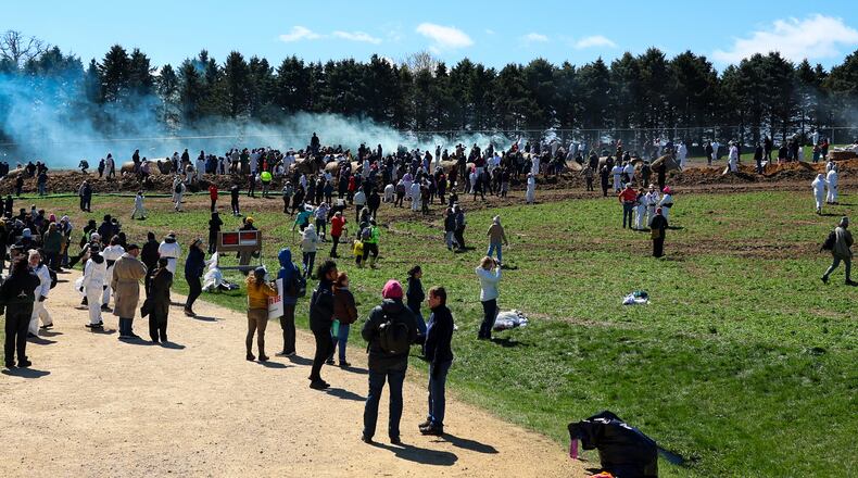 Activists attempt to gain entry into Ridglan Farms beagle breeding and research facility on Saturday, April 18, 2026, in Blue Mounds, Wis. (Owen Ziliak/Wisconsin State Journal via AP)