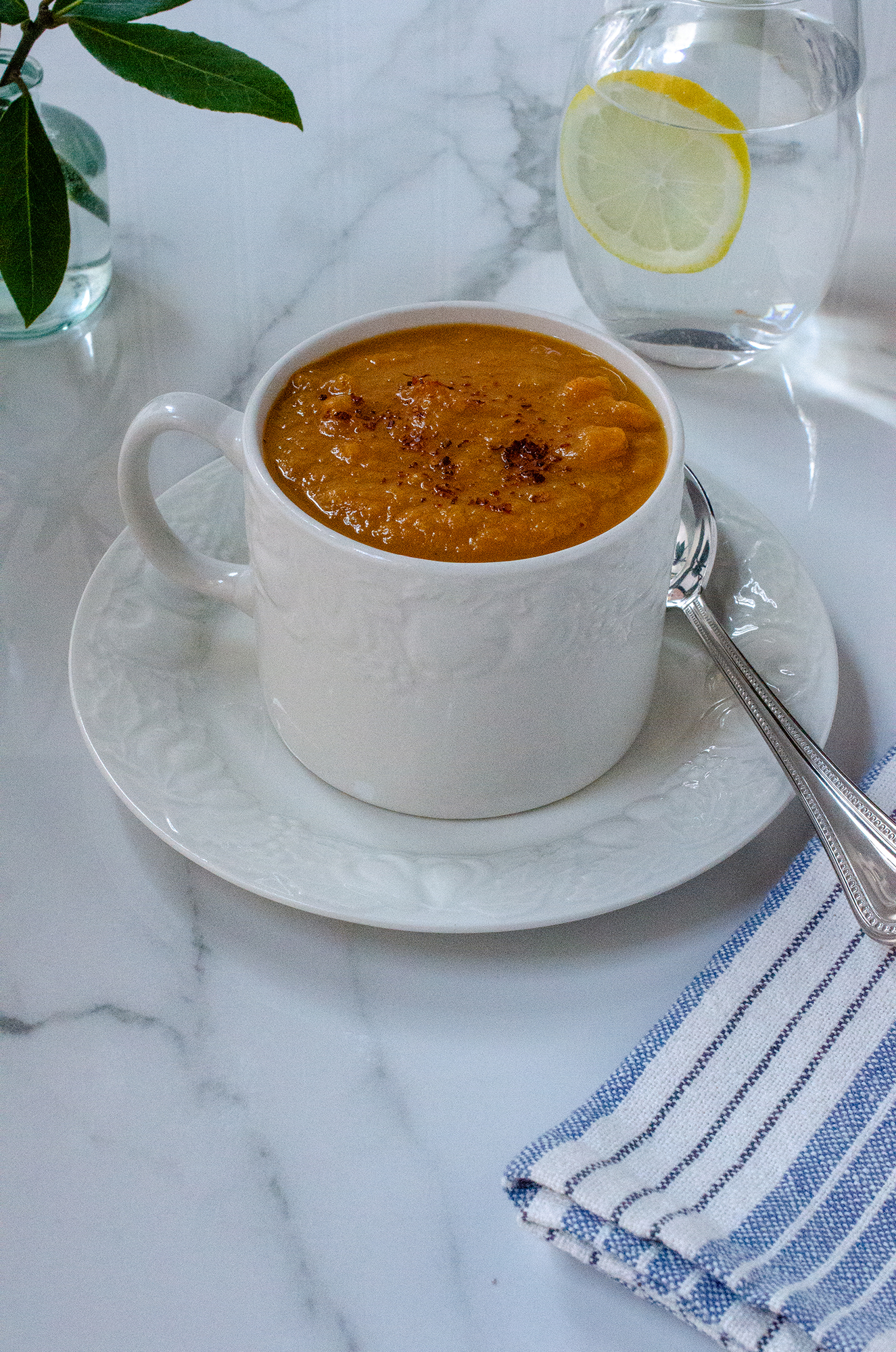 Warm spices and red pepper flakes give this mug of sweet potato soup a kick. Food styling by Cynthia Graubart
(Virginia Willis for The Atlanta Journal-Constitution)