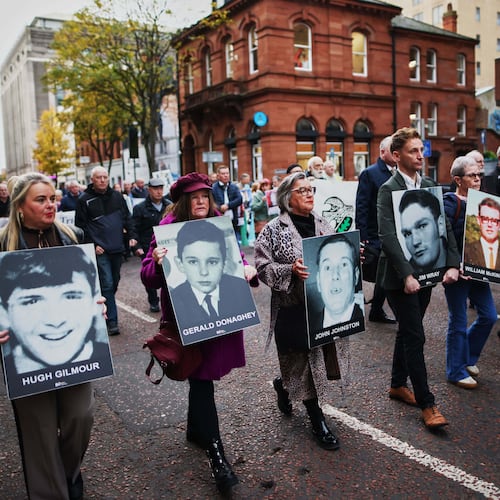 Relatives and supporters of the victims of the 1972 Bloody Sunday massacre march to Belfast Crown Court ahead of the verdict on the trial of a British soldier identified only as Soldier F, Belfast, in Northern Ireland, Thursday, Oct. 23, 2025. (AP Photo/Peter Morrison)