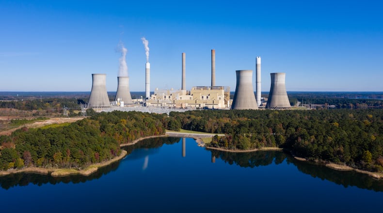 Plant Scherer, a Georgia Power plant. Georgia Power announced a new timeline Monday for phasing out remaining coal-fired power plants, as well as heavy investments in renewables and natural gas to make up the gap. (Elijah Nouvelage for The Atlanta Journal-Constitution)