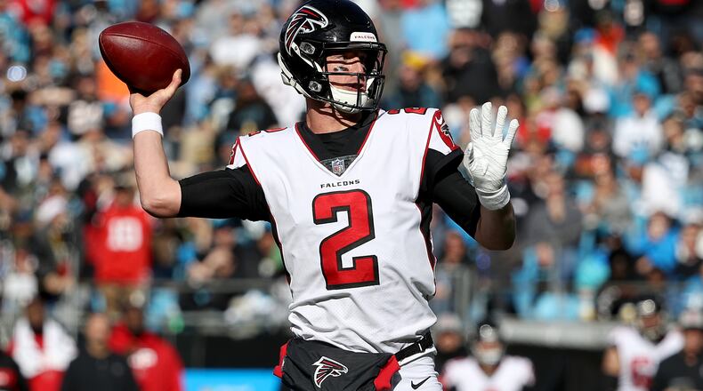 Matt Ryan of the Atlanta Falcons drops back to pass against the Carolina Panthers during their game at Bank of America Stadium on December 23, 2018 in Charlotte, North Carolina. (Photo by Streeter Lecka/Getty Images)