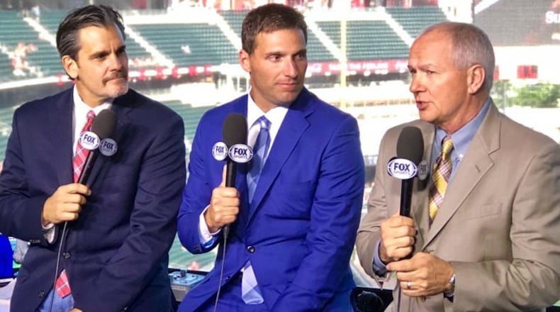 Jeff Francoeur (center) stakes out his spot in the Braves broadcast booth with Chip Caray and Joe Simpson.
