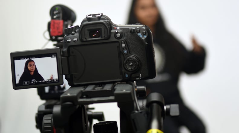 Dania Karim, 17, a high school junior from Bangladesh, speaks about her immigration experience for “Green Card Youth Voices” at Cross Keys High School in Atlanta on Nov. 10, 2017. Green Card Voices is an immigrant advocacy group that is in town interviewing immigrant students for a book to be published in 2018. The book will be the fourth in a series so far from schools in different regions. (Photo: Rebecca Breyer / Special to the AJC)