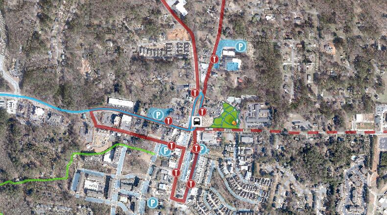 The Woodstock Trolley serves parking lots in the downtown area; recent improvements expanded the capacity of the City Center lot along Towne Lake Parkway. CITY OF WOODSTOCK