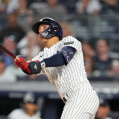 New York Yankees' George Lombard Jr. hits a home run during the fifth inning of a baseball game against the St. Louis Cardinals Tuesday, Aug. 4, 2026, in New York. (AP Photo/Frank Franklin II)