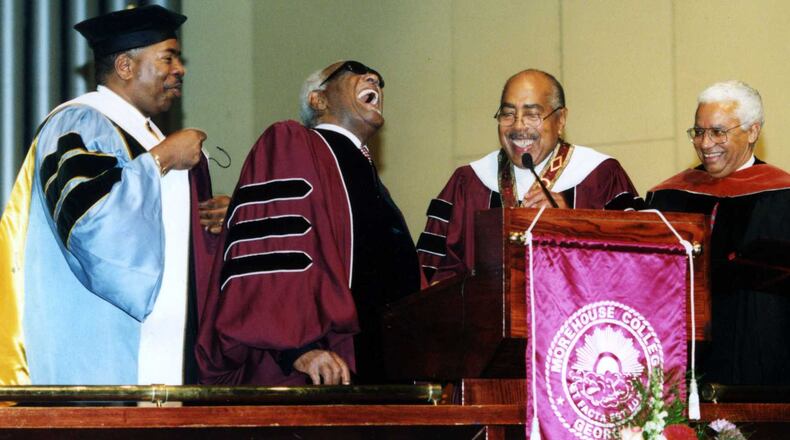 Musical icon Ray Charles, second from left, received a honorary doctoral degree from Morehouse College in 2001. The Ray Charles Foundation contributed $2 million to the college in scholarships for business students, Morehouse officials announced on Friday, March 26, 2021. Photo Credit: Morehouse College.