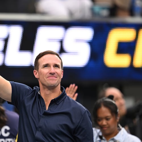 FILE - Drew Brees waves to the crowd during the first half of an NFL football game between the Los Angeles Chargers and the Denver Broncos, Sunday, Sept. 21, 2025, in Inglewood, Calif. (AP Photo/Carrie Giordano, file)