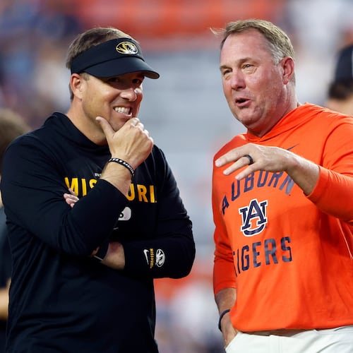 Missouri head coach Eli Drinkwitz (left) talks with Auburn head coach Hugh Freeze (right) before an NCAA college football game, Saturday, Oct. 18, 2025, in Auburn, Ala. (Butch Dill/AP)