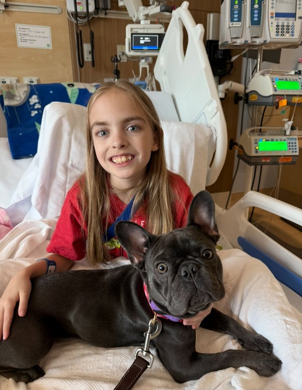 Kelsey Brackett, 9, was at Children's Healthcare for over 100 days, when she received special permission for her French bulldog Quinn to visit her. (Courtesy of Sonja Brackett)