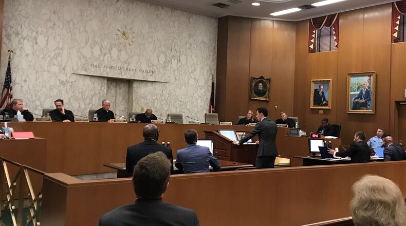 University of Georgia law student John Lex Kenerly present a case challenging the DeKalb County commission’s surprise pay raise during a Georgia Supreme Court session on Oct. 22, 2019. TIA MITCHELL/TIA.MITCHELL@AJC.COM
