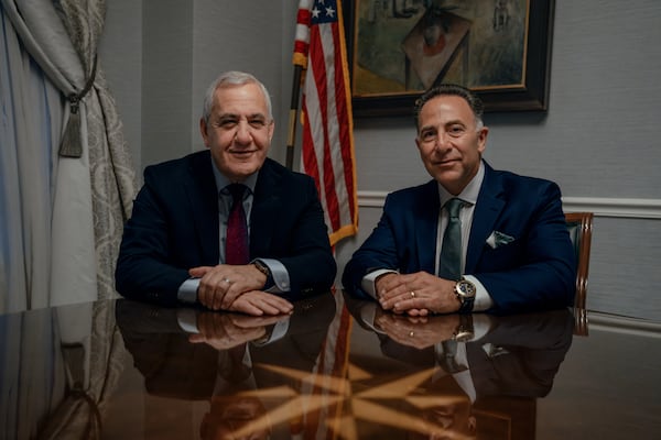 Jim Vena, CEO of Union Pacific Railroad, left, and Mark George, president and CEO of Norfolk Southern, during an interview at Railway Age’s Next Generation Freight Rail conference at the Union League Club of Chicago on March 10, 2026, in Chicago. Union Pacific Corporation and Norfolk Southern are seeking federal regulatory approval for a merger of their two companies, which would create the nation's first transcontinental railroad company. (Jamie Kelter Davis for the AJC)