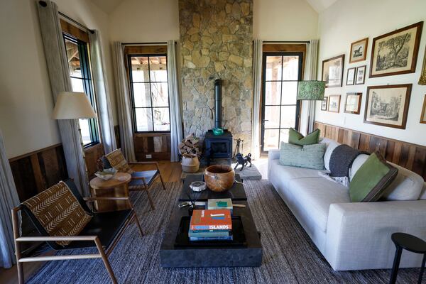 The interiors of the Ember cabin are balanced with selected designer furniture. The Quercus resort is seasonal, so the cabins close in the height of summer. (Miguel Martinez/AJC)