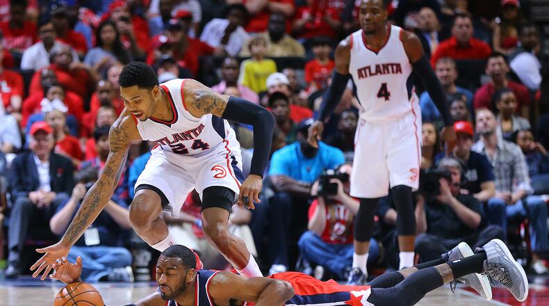 The Hawks had John Wall and the Washington Wizards down early but went cold and lost the opener of their second-round playoff series. (Curtis Compton, ccompton@ajc.com)