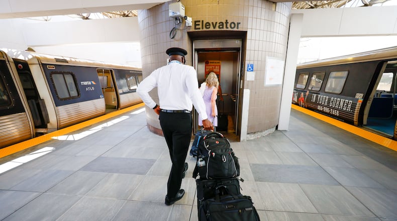 Travelers are seen entering the elevator at the newly renovated MARTA Airport Station, which opened to the public on Monday, May 20, 2024. The renovation, which took about six weeks, included new flooring, replacing ceilings and lighting, and installing infrastructure for a new elevator.
(Miguel Martinez / AJC)