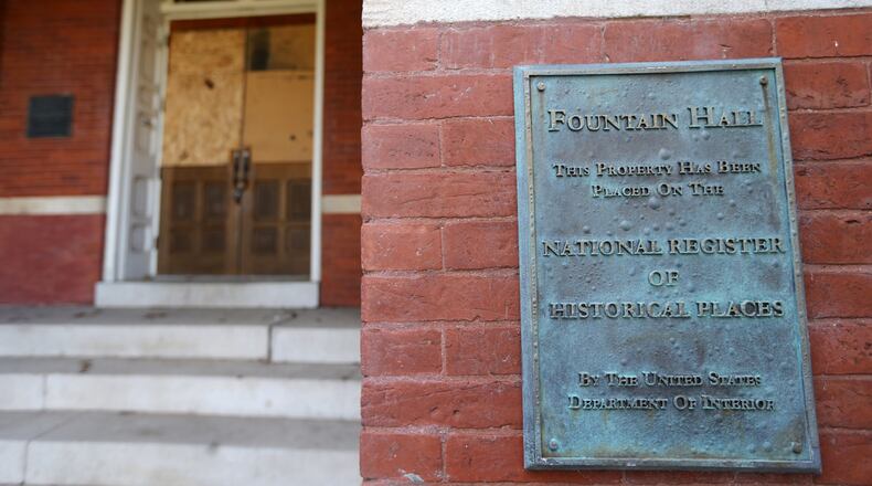 Historic Fountain Hall sits boarded up on the Morris Brown College campus. For decades the High Victorian style, three-story, red brick building served as an administration building, chapel and library for both Atlanta University and Morris Brown College. It was made a National Historic Landmark in 1975. Ben Gray / bgray@ajc.com