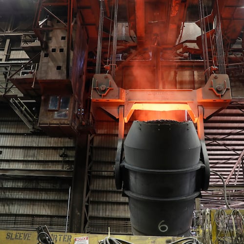FILE - A giant ladle glows red after pouring molten iron in to a vessel inside the basic oxygen furnace as part of the processes of making steel at the U.S. Steel Granite City Works facility Thursday, June 28, 2018, in Granite City, Ill. (AP Photo/Jeff Roberson, File)