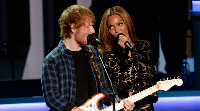 Ed Sheeran (L) and Beyonce teamed up for a duet version of Sheeran's song "Perfect."