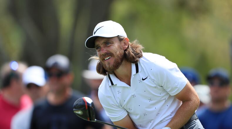 First-round co-leader Tommy Fleetwood stares down his tee shot on No. 9 Thursday in the first round of the Players Championship. (Photo by Sam Greenwood/Getty Images)