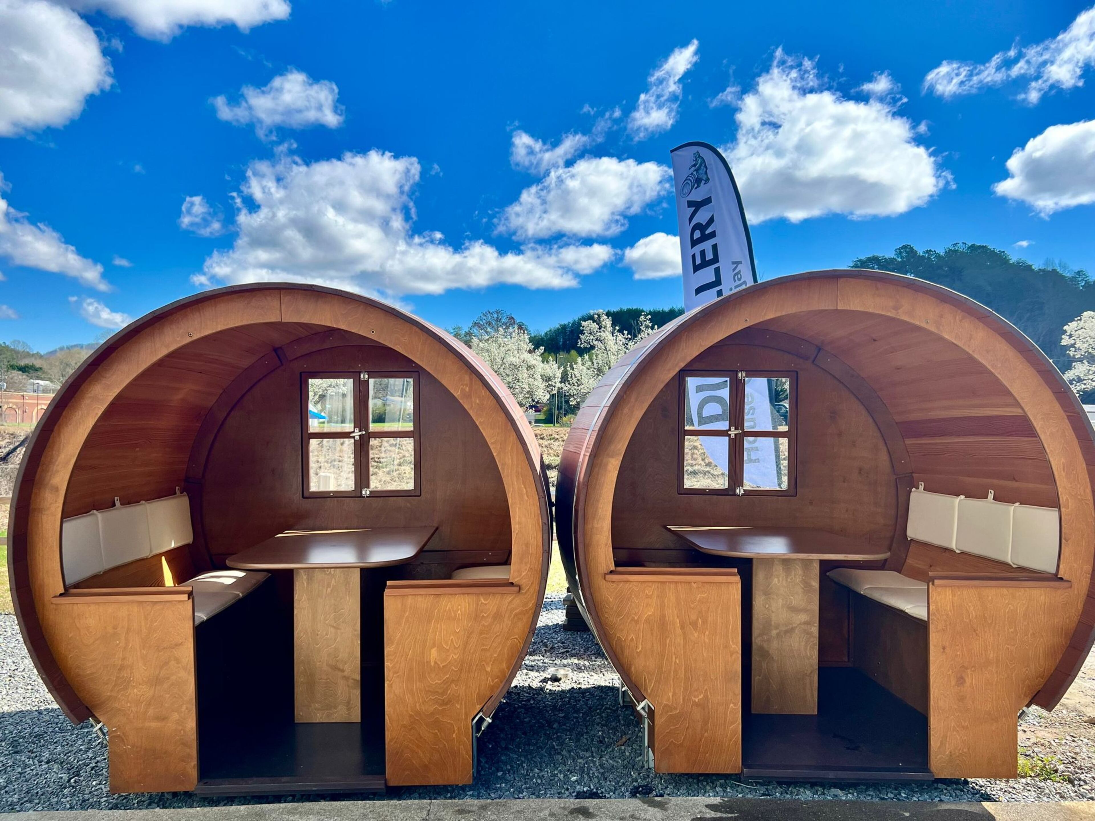 These shelters known as "bear barrels" provide a cozy, shaded spot to sip House of Applejay liqueurs. (Courtesy of House of Applejay)