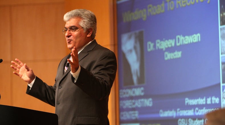 Rajeev Dhawan, director of the Economic Forecasting Center, says the Federal Reserve's rate hikes will throw many of Georgia sectors into reverse later this year, but that the worst cuts will be in white collar jobs like tech. He spoke during the center’s quarterly conference on Wednesday. (Photo: Vino Wong vwong@ajc.com)