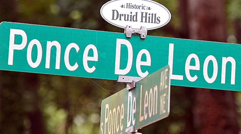 July 31, 2014 Atlanta - Picture shows street signs near Dellwood Park in Historic Druid Hills on Thursday, July 31, 2014. Druid Hills residents are considering annexing themselves into the city of Atlanta, which would be a major expansion for the city affecting its educational system, tax base and racial makeup. HYOSUB SHIN / HSHIN@AJC.COM