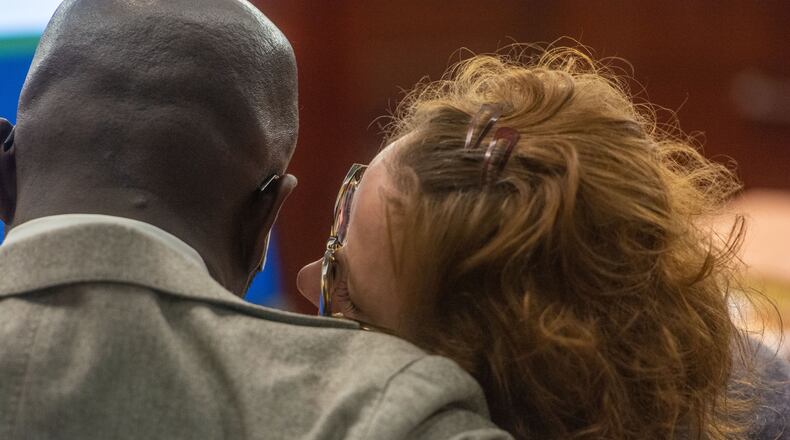 Former Glynn County District Attorney Jackie Johnson (right) speaks with defense attorney Keith Adams on Tuesday, Jan. 21, 2025, during the first day of jury selection in her trial. (Michael Hall/The Brunswick News)