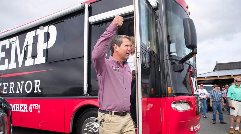 10/01/2018 -- Jasper, Georgia -- Georgia Republican Gubernatorial candidate Brian Kemp exits his campaign bus during a campaign stop at Appalachian Gun, Pawn &Range in Jasper, Monday, October 1, 2018. Monday was the first day of Brian Kemp's weeklong bus tour where he and his campaign will visit 27 counties in 5 days. (ALYSSA POINTER/ALYSSA.POINTER@AJC.COM)
