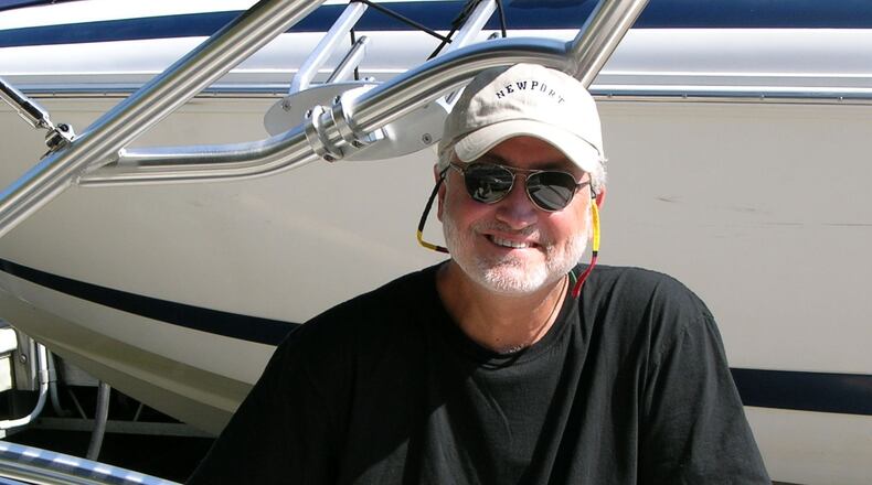 Longtime radio producer and advertising executive John Lambis, who died Dec. 26 at age 76 after a brief illness, loved sailing and owned sailboats, his family said. (Courtesy of Kristina Sullivan)