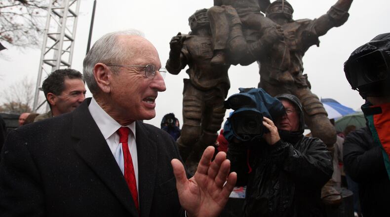 Vince Dooley applauds after a statue of himself was unveiled at a dedication ceremony  for the University of Georgia Vince Dooley Athletic Complex in Athens Saturday Nov. 28, 2008, in Athens.  (Brant Sanderlin/The Atlanta Journal-Constitution/TNS)