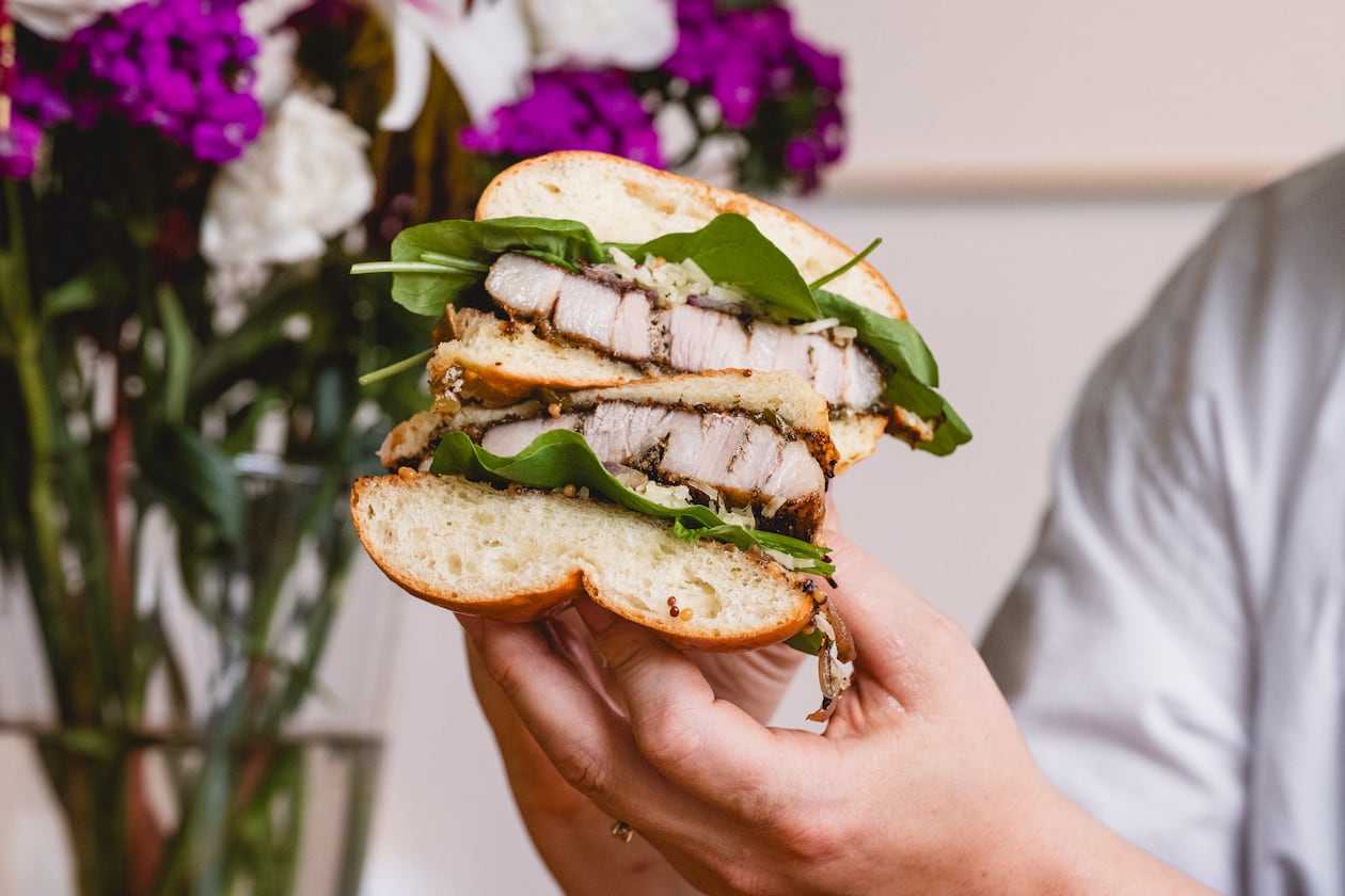 A porchetta sandwich from Kinship Butcher & Sundry. (Credit: Sarah Carpenter, courtesy of Kinship Butcher & Sundry)