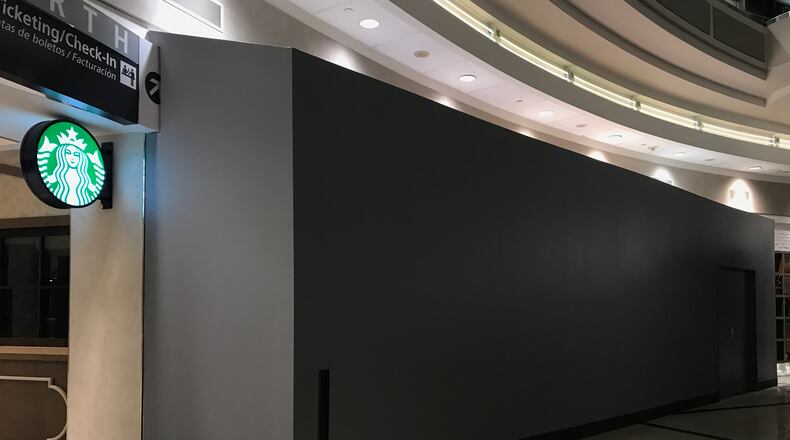 The closed La Madeleine, where the new Starbucks will be located in the domestic terminal atrium.