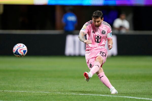 Inter Miami's Lionel Messi scores his side's second goal during the Club World Cup group A soccer match between Inter Miami and FC Porto in Atlanta, Thursday, June 19, 2025. (AP Photo/Brynn Anderson)